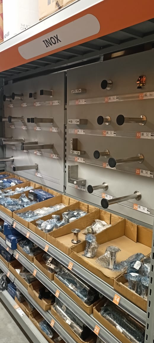 Modular retail shelving with product display panels and storage bins