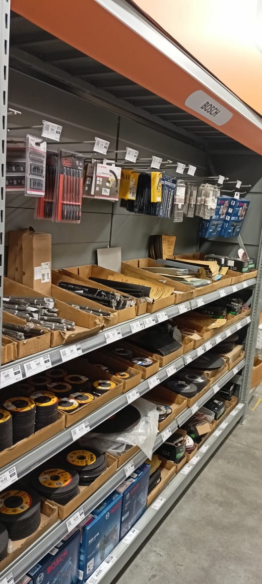 Back-of-house storage racks with organised hardware inventory